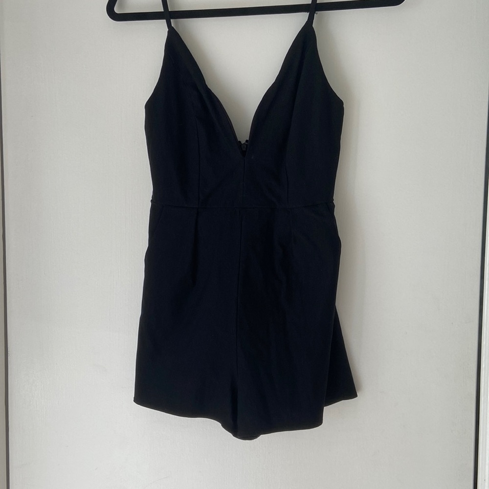 Plunge line black romper size medium